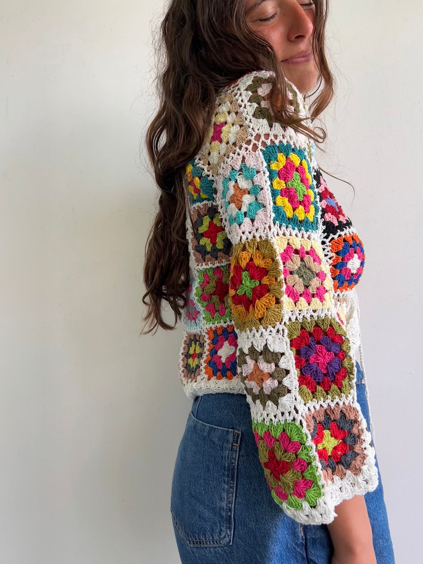 White granny square crochet cardigan with tassel tie