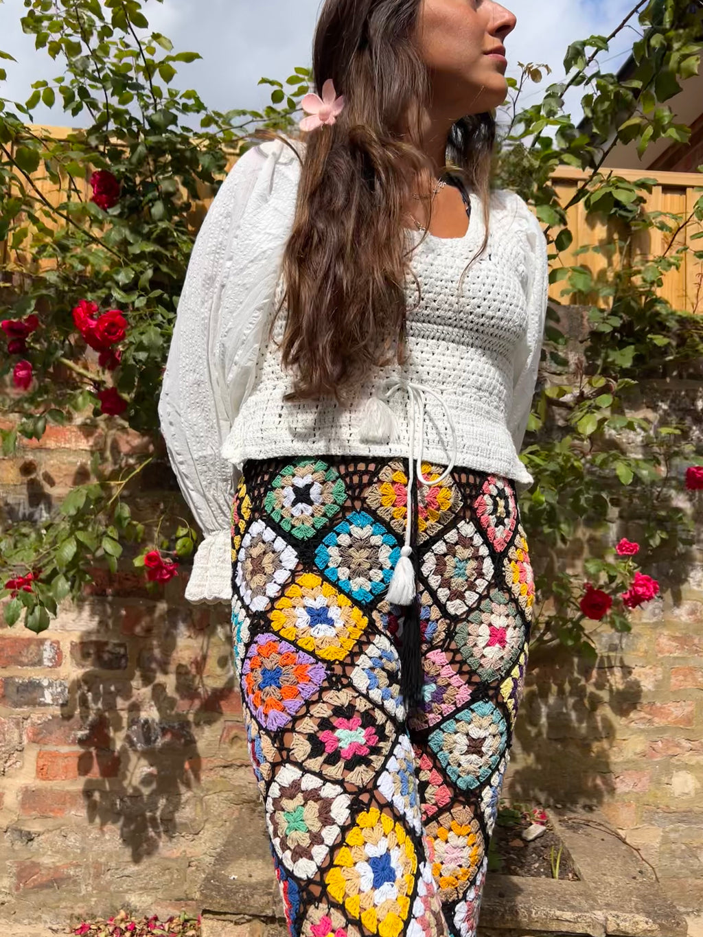 Black Granny square pom pom flare trousers with drawstring waist